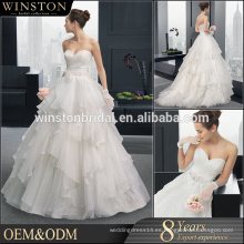 Vestido de novia con volantes de organza por encargo de alta calidad